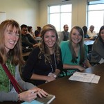 Attendees posing for a photo